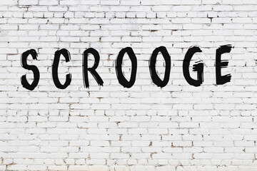 Inscription scrooge painted on white brick wall - obrazy, fototapety, plakaty