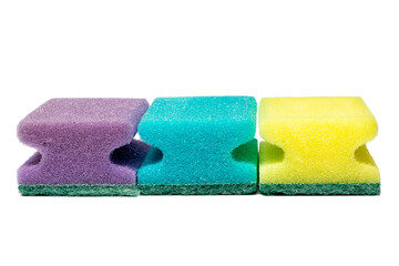 Multicolored sponges for cleaning, isolated on white background.