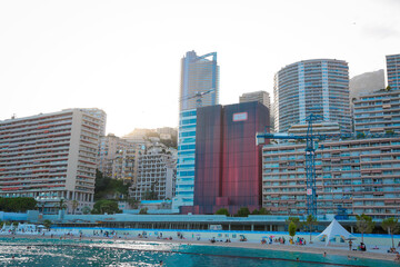 Obraz premium Monaco-Montecarlo, wonderful city of the cote-d‚ÄôAzur with its marine and architectures, Larvotto Beach, in a sunny day with blue sky