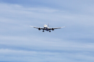 Fototapeta na wymiar Latam airlines plane in the sky of Rapa Nui, Easter Island, Chile