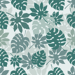 Tropical leaves seamless pattern on light blue background. Monstera leaves botanical pattern. Vector background for wrapping paper and digital paper design.
