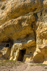 the remains of a medieval fortress city (according to other sources - a monastery) Tepe-Kermen, covering the upper part of the mountain in several tiers