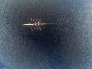 Boat four rowing, Aerial drone view, Corrib river, Galway city, Ireland. Concept outdoor activity, sport, adventure, © mark_gusev