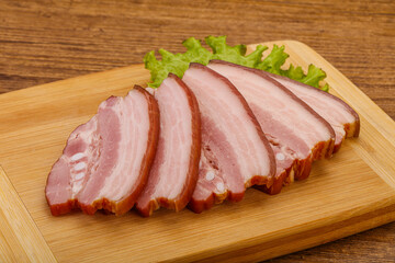 Tasty smoked pork brisket slice