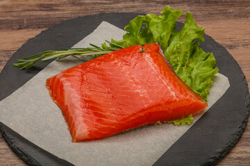 Salmon piece steak served rosemary