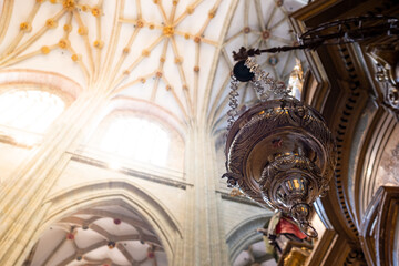 close up of a thurible, a metal censer use to spread incense during masses inside an ancient...