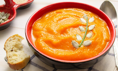 Orange pumpkin or carrot puree soup