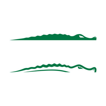 the logo of a swimming crocodile