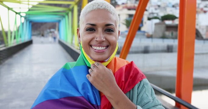 Young woman wearing gay pride mask - Slow Motion