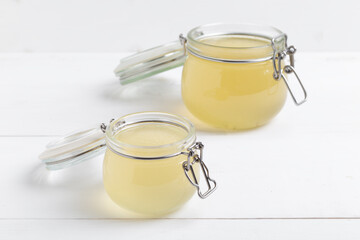 Bone broth made from chicken, beef or lamb in a glass jar