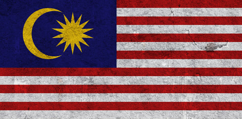 Fahne von Malaysia auf verwittertem Beton