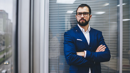 Contemplative male entrepreneur in optical spectacles for provide eyes correction thoughtful looking away during working day in office interior, formally dressed businessman in classic eyewear