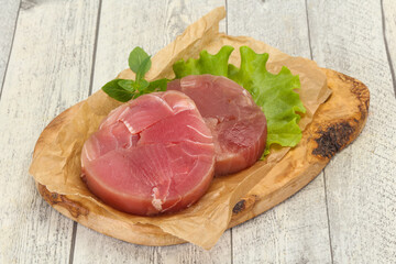 Raw tuna round steak for grill