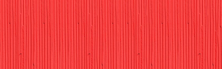 Panorama of Modern red stone wall with stripes texture and seamless background