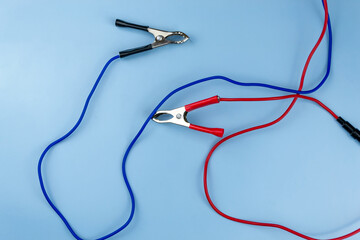 Jumper cable, on a blue background