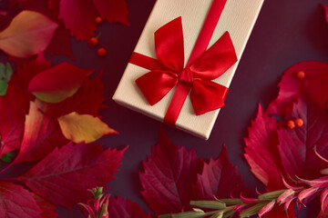 Christmas box with red ribbon