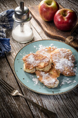 Homemade pancakes on a wooden table.