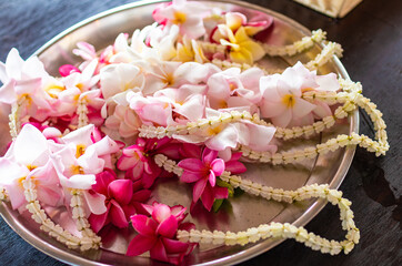 traditional oriental decorations from frangipani flowers, celebration and fun, objects of worship in temples, Hawaiian garlands
