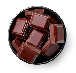 Bowl of dark chocolate isolated on white, from above