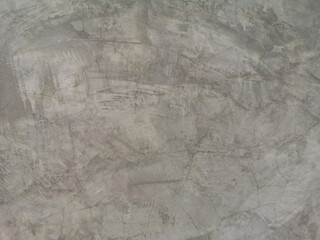 Cracks on the Cement wall has gray color and smooth abstract surface texture concrete material background