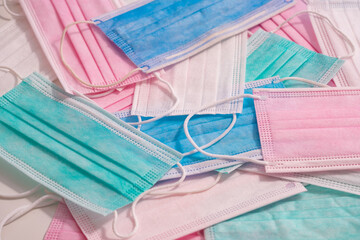 Collection of colorful disposable face masks stock photo