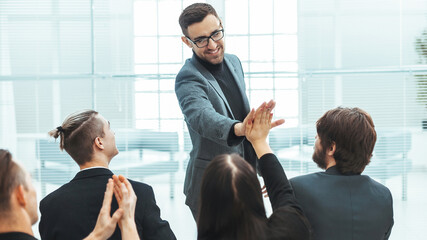 business colleagues giving each other a high five