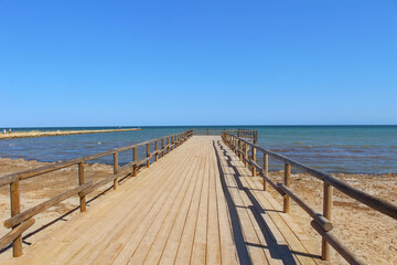 Fototapeta premium Embarcadero de la playa de la Gola, Santa Pola, España