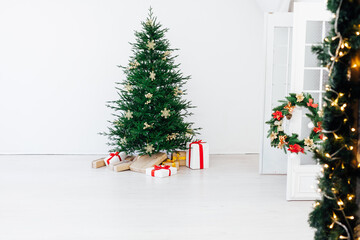 Christmas card for the new year presents the Christmas tree pine decor winter interior