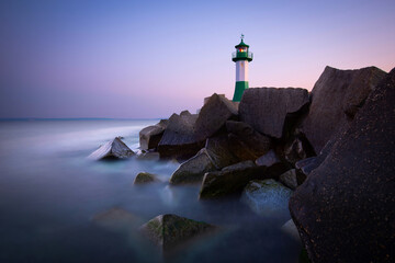 Fototapeta premium The lighthouse in the harbor of Sassnitz, Baltic Sea - Germany