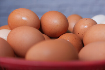 close up of eggs in a bowl.