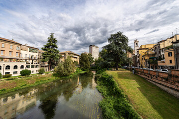 Fototapeta na wymiar The River Bacchiglione in the Padua city view from the Ponte Molino (mill bridge). Veneto, Italy, Europe.