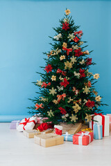 Christmas tree pine with gifts for the new year interior postcard banner background