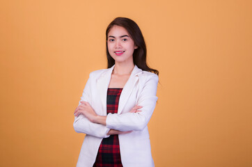 Office worker beautiful asia young woman, on yellow color background with copy space. Human face expressions, emotions feelings, body language,beauty and fashion concept.