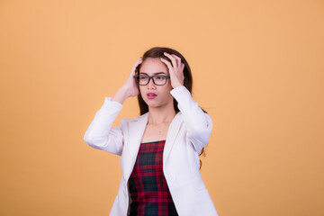 Office worker beautiful asia young woman, on yellow color background with copy space. Human face expressions, emotions feelings, body language,beauty and fashion concept.
