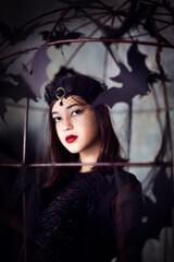 
Halloween style girl in dark studio