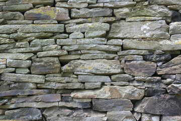 Texture background masonry castle made of stone.