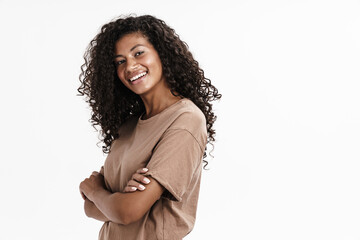 Happy positive young african girl posing isolated