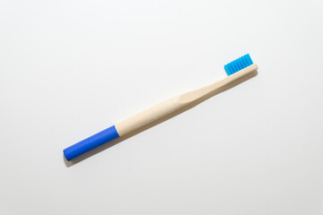 Bamboo toothbrush on a white background Ecological and sustainable product concept. Eco friendly.