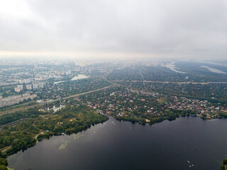 High aerial view of Kiev and the Dnieper river from under the clouds.