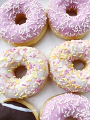 Fresh doughnuts with cream and chocolate macro
