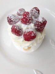 Anna Pavlova cake with cream and berries 