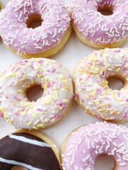 Fresh doughnuts with cream and chocolate macro