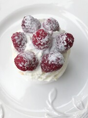 Anna Pavlova cake with cream and berries 
