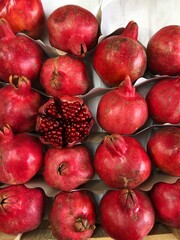 Delicious ripe pomegranates on the market macro 