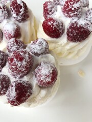 Anna Pavlova cake with cream and berries 