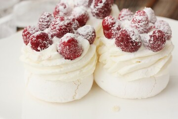 Anna Pavlova cake with cream and berries 
