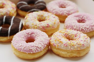 Fresh doughnuts with cream and chocolate macro