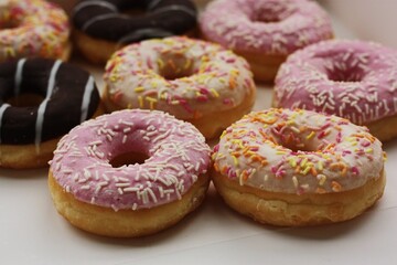 Fresh doughnuts with cream and chocolate macro