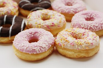 Fresh doughnuts with cream and chocolate macro