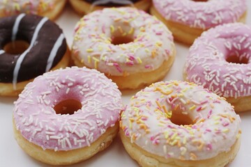 Fresh doughnuts with cream and chocolate macro